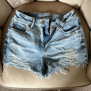 Light washed ripped denim shorts